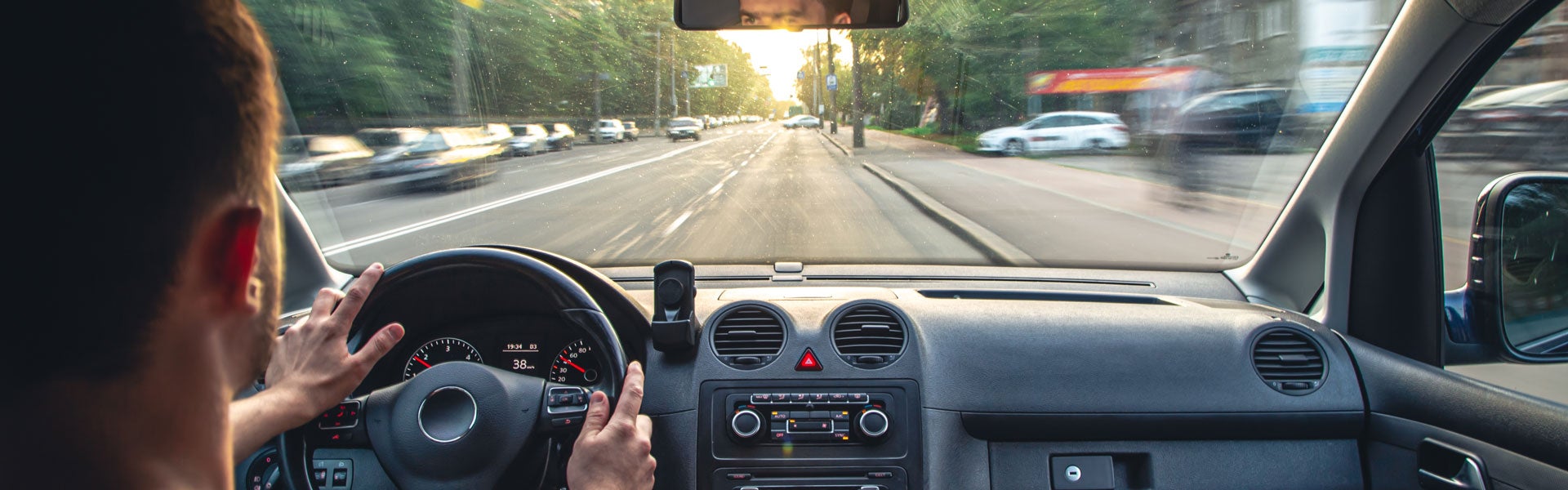Driver using a phone behind the wheel